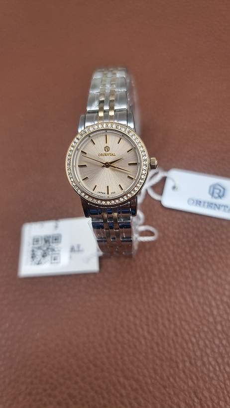 ساعت مچی زنانه اورینتال دو رنگ طلایی نقره ای